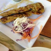 4 Piece Chicken Satay · Skewered, marinated chicken strips flash fried and finished on the grill. Served with peanut...