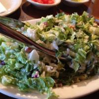 Loaded Salad · Tossed with chopped romaine lettuce, tomatoes, garbanzo beans, sweet onions, pepperoncini, s...