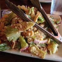 BBQ Chicken Salad · Grilled chicken tossed in our house BBQ sauce with red onion, sweet corn, mozzarella cheese,...