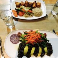 Grilled Chicken Shish · Marinated chunks of char-grilled chicken. Served with rice and vegetables.