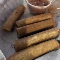 Lumpia · Hand rolled beef with vegetables and served with duck sauce.