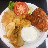 Buffalo Chicken Sandwich · Fried chicken breast dipped in your choice of 1 of our sauces with lettuce and tomatoes. Ser...