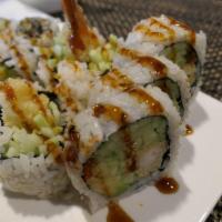 Shrimp Tempura Roll · Shrimp tempura ,avocado ,cucumber, masago and eel sauce on top.