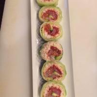 Protein Roll · In: spicy tuna, crab, salmon, tuna, albacore, red snapper, avocado and cucumber wrapped.