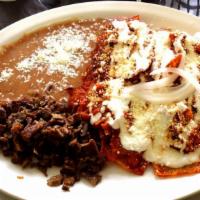 Carne Asada · Thin cut beef tenderloin served with rice, refried beans, salad, and 2 handmade tortillas. W...