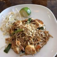 Pad Thai · Stir-fried thin rice noodle, egg, bean sprout, scallion, and crush peanuts with sweet tamari...