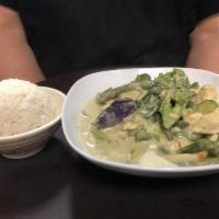 Red Curry · Mildly spicy. Cooked in coconut milk with broccoli, green pepper, onion, and tomato, green b...