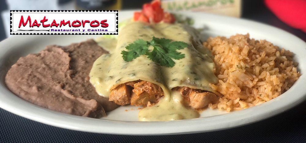 Cilantro Chicken Enchiladas · 2 chicken enchiladas covered with our white wine cilantro sauce. Served with rice and beans.
