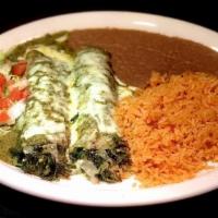 Spinach Enchiladas · 2 spinach and mushroom enchiladas topped with Monterrey Jack cheese and creamy spinach sauce...