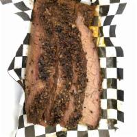 Beef Brisket · Seasoned with our original recipe beef rub and cooked low and slow on-site with pecan and hi...