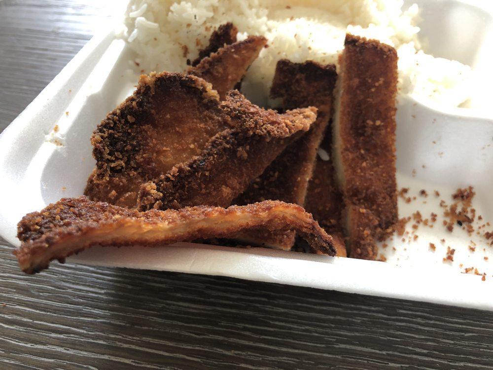 Chicken Katsu · Deep fried boneless chicken served with rice and salad.