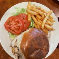 Grilled Chicken Sandwich · Grilled chicken breast, avocado, lettuce, tomatoes, and provolone cheese on a brioche bun.