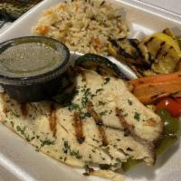 Grilled Tilapia · Served with rice and grilled veggies.