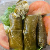 Dolmeh · 5 pieces. Stuffed grape leaves with rice, fresh herbs and seasonings.