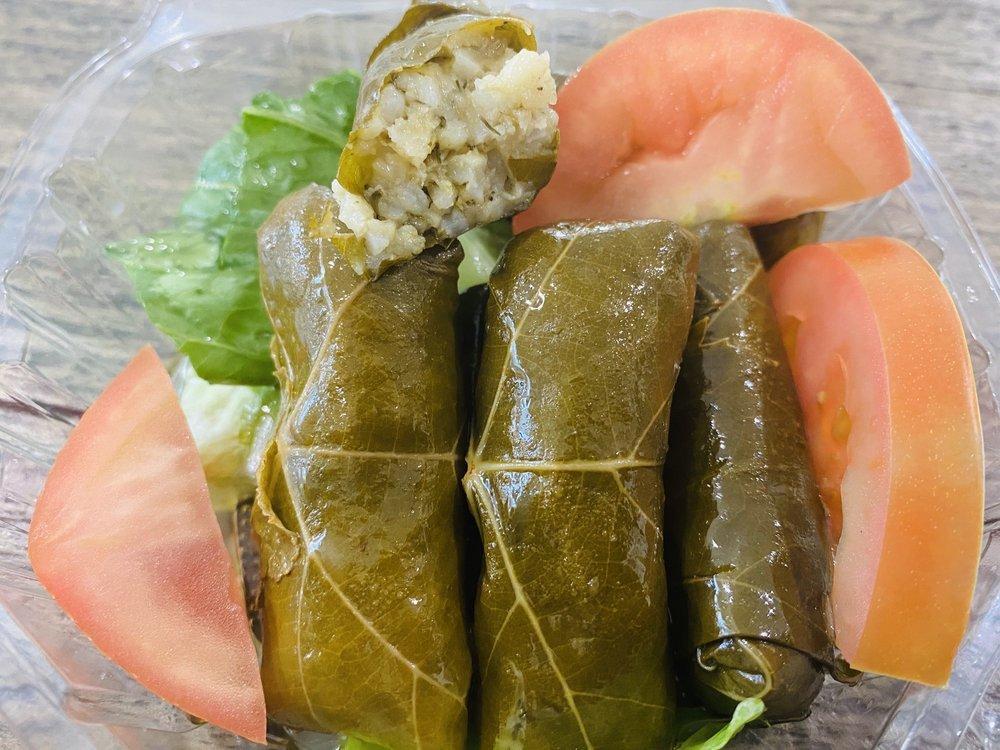 Dolmeh · 5 pieces. Stuffed grape leaves with rice, fresh herbs and seasonings.