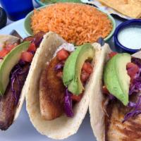 Baja Fish Tacos · 3 tacos made with homemade style corn tortillas, baja style tilapia grilled or breaded, red ...