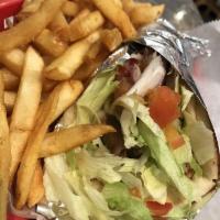 Gyro Pita · Seasoned grilled beef and lamb slices wrapped in a pita with lettuce, tomato, onion and tzat...
