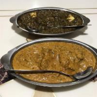 Lamb Korma · Boneless lamb cooked with spices, cream and cashew nut.