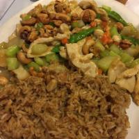 Cashew Chicken · Fresh crunchy cashews stir fried with carrots, celery, peapods, and water chestnuts in a lig...