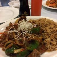 Mongolian Beef · Beef sauteed with onions, carrots, and green peppers in a special hot sauce. Spicy.
