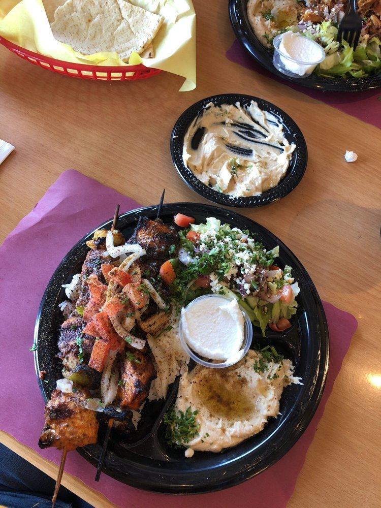 Chicken Kabob Plate · Grilled marinated chicken. Served with hummus, jasmine rice, house salad and pita.