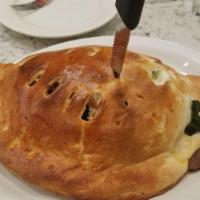 Calzone · Served with your choice of fries, salad, or soup.