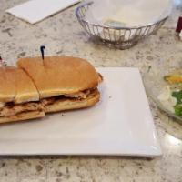 Grilled Chicken · Cooked on a rack over a grill.