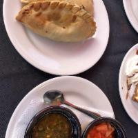 Empanadas · Our famous Argentine empanadas. Comes with choice of baked or fried.