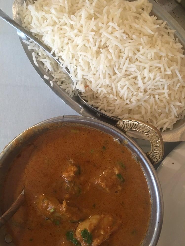 Chicken Curry · Chicken cooked in a traditional mughlai sauce. Served with basmati rice.