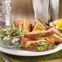 Club Sandwich · Turkey breast, bacon, lettuce, tomato and mayo on toasted 7-grain bread.