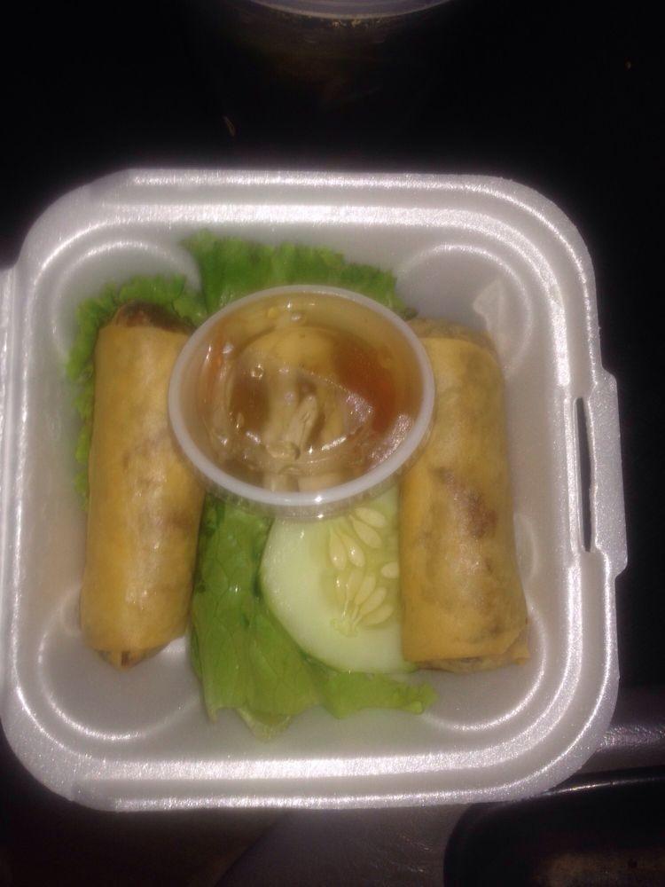 Spring Roll · Shredded vegetables, clear noodles, minced beef, and shrimp wrapped and deep-fried. Served with a side of sweet, tangy garlic sauce