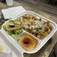 Chicken Platter · Grilled chicken shawarma, salad, rice, salata, tzatziki, hummus, pita bread.