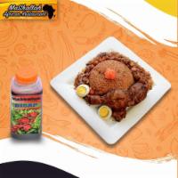 Chep Garnar · Red Jollof rice with chicken and onion sauce  and mixed vegetables on the side.