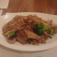 Pad See Eiw · Stir fried large rice noodles with egg, and broccoli in sweet soy sauce.