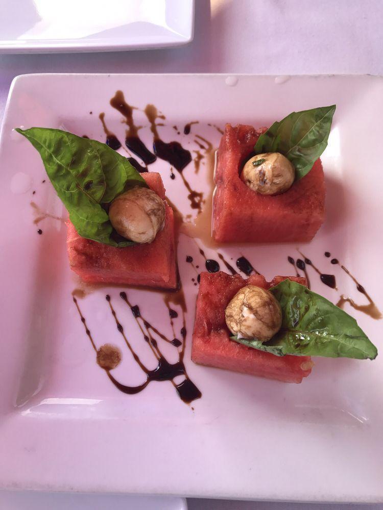 Caprese Salad · Traditional Caprese, sliced riped tomatoes topped with fresh mozzarella cheese, fresh basil and a drizzle of our basil lemon dressing. Gluten free. Vegetarian.