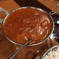 Butter Chicken · Boneless pieces of chicken cooked in a tomato based sauce with butter and fenugreek leaves. ...