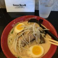 Tonkotsu Ramen · Rich pork broth with chashu, soft boiled egg, bean sprout, green onion, wood ear mushroom.