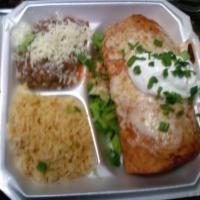 Burrito Ranchero Combination · Charbroiled steak, chicken or al pastor topped with delicious salsa, molted with Monterey Ja...