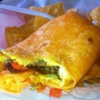 Early Bird Burrito · Served with 2 scrambled eggs with melted Monterey Jack cheese, fresh salsa and a choice of c...