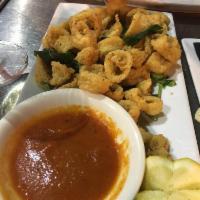 Crispy Calamari · Fresh sage and marinara sauce.