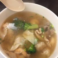 Wonton Soup · Seasend broth with filled wonton dumplings.