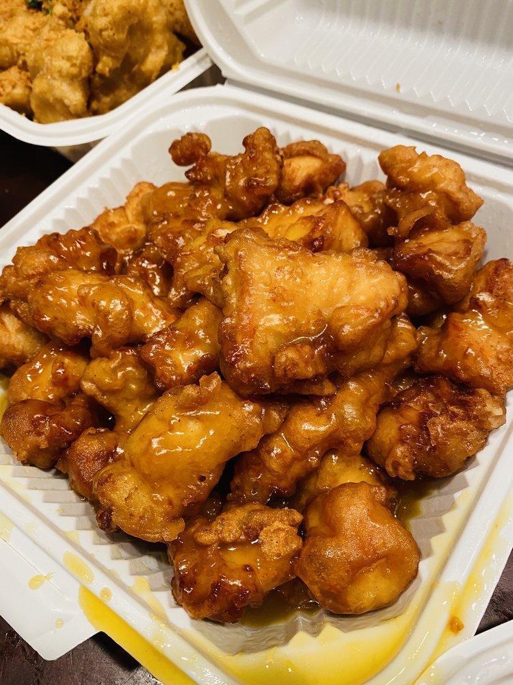 Orange Chicken · Battered and cooked in a sweet orange sauce.