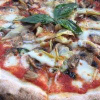 Capricciosa Pizza · Tomato sauce, fior di latte mozzarella, artichokes, mushrooms and black olives.