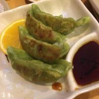 Gyoza · 6pcs Pan steamed pork, chicken, vegetable Japanese dumplings