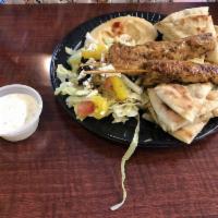 Chicken Kabob Platter · Served with homemade hot pita, Greek salad and rice.