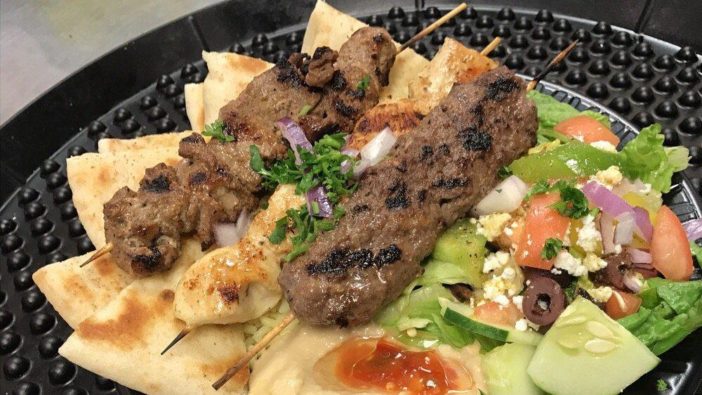 Mixed Grill Platter · Chicken, beef and kafta served with homemade hot pita, Greek salad and rice.