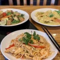Shrimp and Chicken Pad Thai · Rice Noodles stir-fried with eggs, sprouts, red peppers, onions and peanuts in spicy Thai sa...