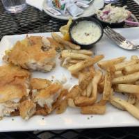 Fegley's Beer Battered Fish and Chips · Fegley's ESB hand-battered cod fillets, fresh-cut fries, tartar sauce, coleslaw