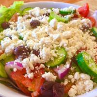 Greek Salad · Greek feta cheese, romaine lettuce, cucumber, red onions, Kalamata olives, tomatoes served w...
