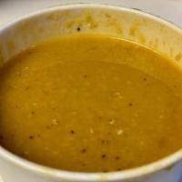 Lentil Soup · Red lentils mixed with onions and Mediterranean spices.